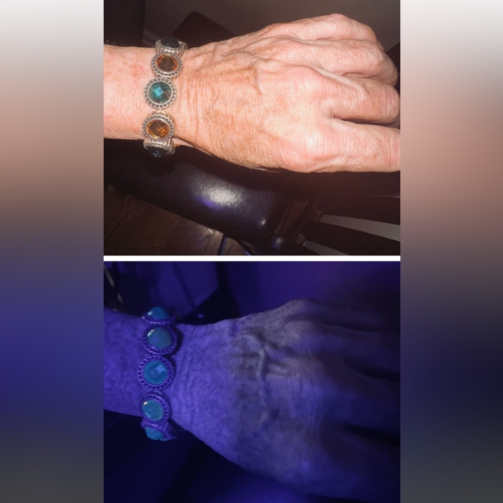 Silver Stretch Bracelet with Green and Orange Stones that react to UV light